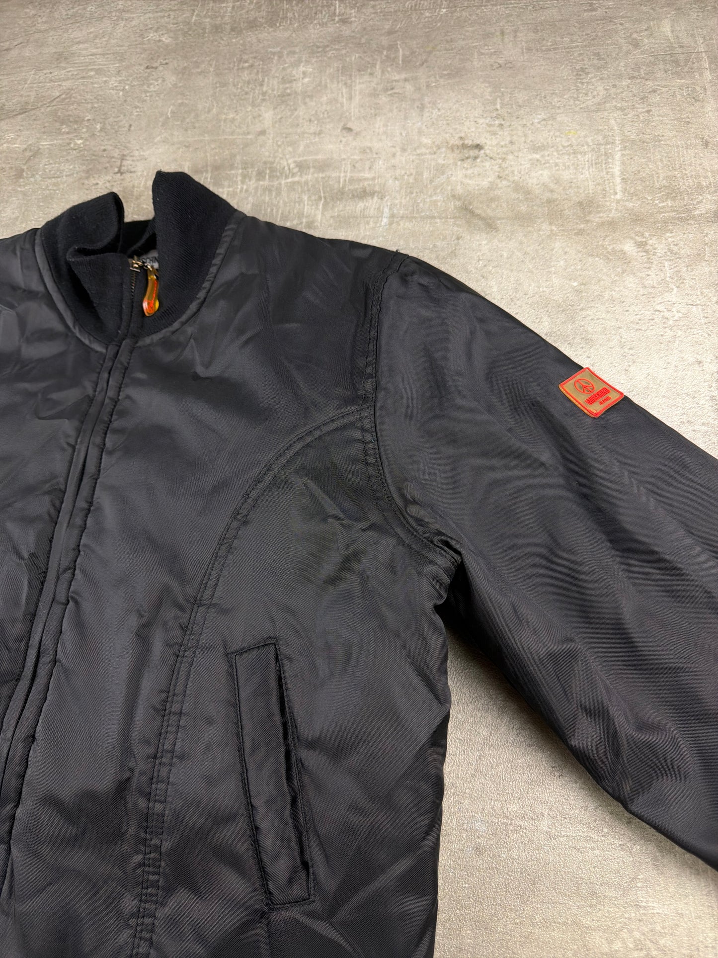 Moschino Jeans Archive Peace Patch Bomber Jacket – All Black / Red Lining