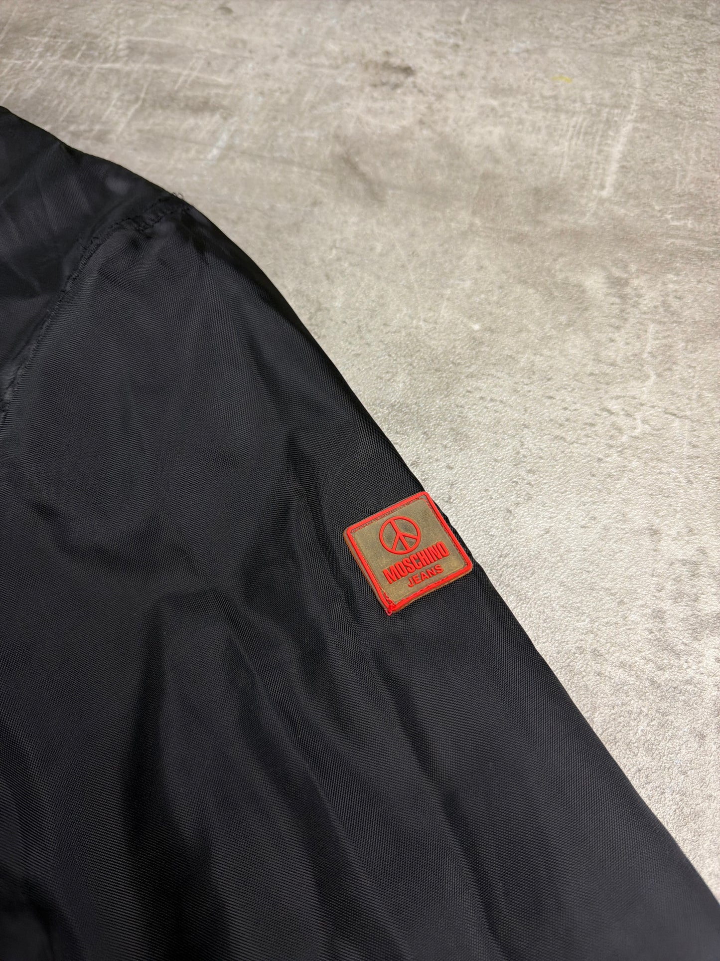 Moschino Jeans Archive Peace Patch Bomber Jacket – All Black / Red Lining